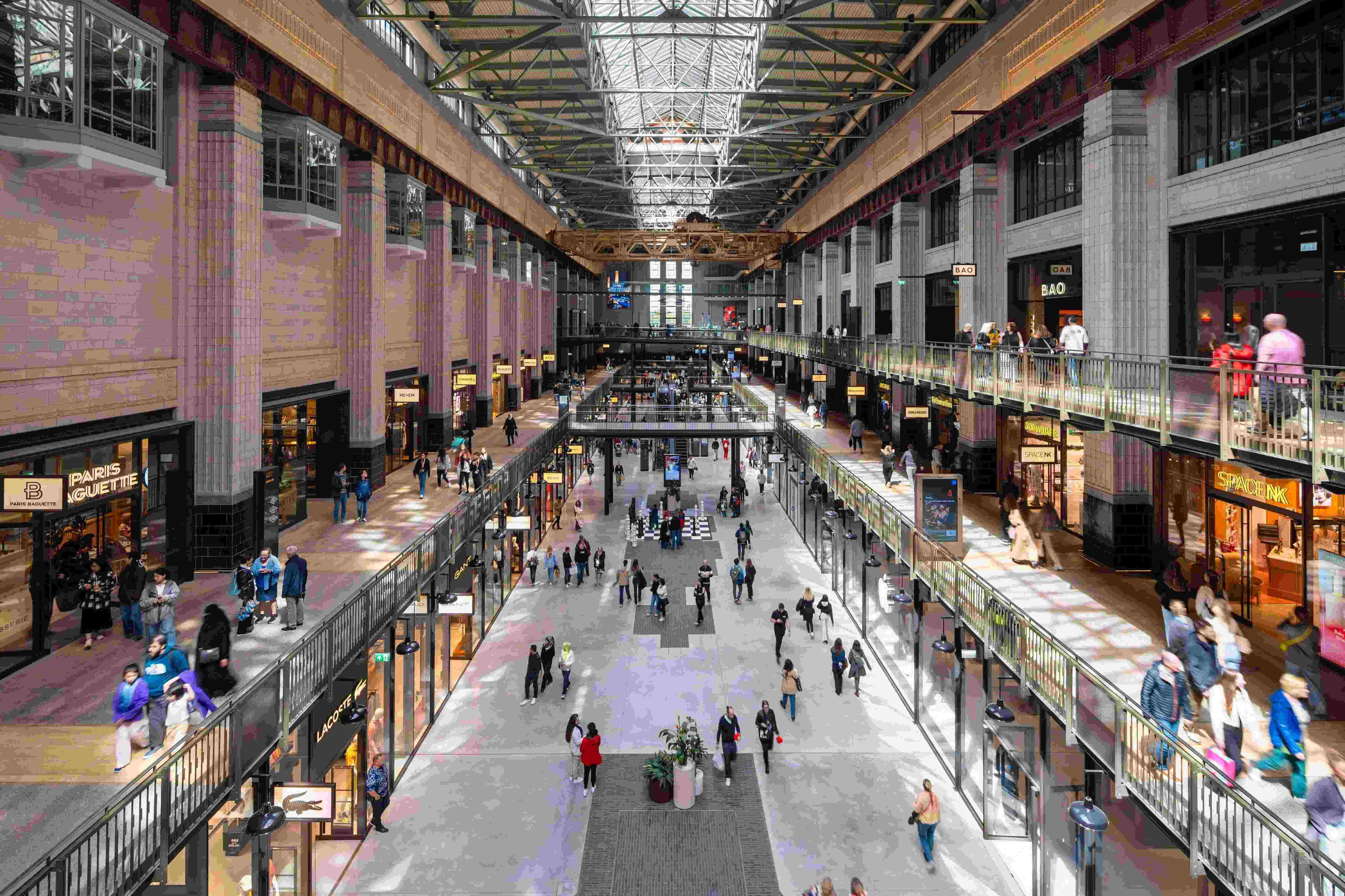 A luxurious guest room in the Orient Express La Minerva, featuring a plush bed with rich textiles and classic decor.